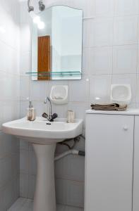 A bathroom at Apartments Kalaitzakis with private pool