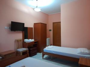 Een bed of bedden in een kamer bij Hotel Rossi