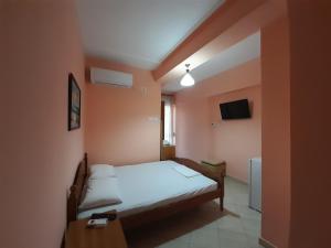 Een bed of bedden in een kamer bij Hotel Rossi