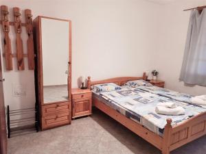 Postel nebo postele na pokoji v ubytování Room for two in House of relax Ahtopol
