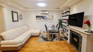 Kuchyň nebo kuchyňský kout v ubytování Apartment Markovski