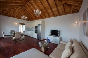 a living room with a couch and a table at Villas Taburiente in Los Llanos de Aridane