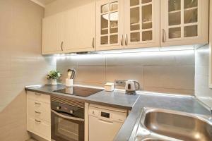 Kjøkken eller kjøkkenkrok på Apartamento Primera Linea de Mar con Espectaculares Vistas