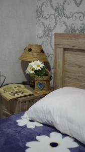 Postel nebo postele na pokoji v ubytování Akhaltsikhe hotel “Sunny House”