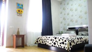 Postel nebo postele na pokoji v ubytování Akhaltsikhe hotel “Sunny House”