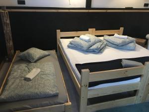 Postel nebo postele na pokoji v ubytování Hostel PrzyMorze