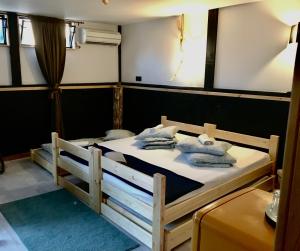Postel nebo postele na pokoji v ubytování Hostel PrzyMorze