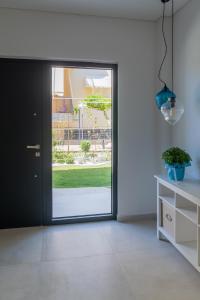 Kép Two Olive Trees - Deluxe Apartments szállásáról Pszathópirgoszban a galériában