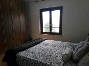 Uma cama ou camas num quarto em Appartamento Il Mulino