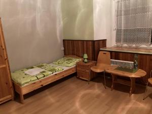 Posteľ alebo postele v izbe v ubytovaní Penzión Borovica