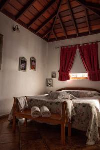 Ένα ή περισσότερα κρεβάτια σε δωμάτιο στο Casa Micaela +65 φωτογραφίες