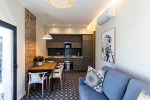 Kuchyň nebo kuchyňský kout v ubytování Apartamentos El Patio Plaza Mayor Cáceres