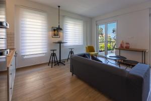 A seating area at Two Olive Trees - Deluxe Apartments