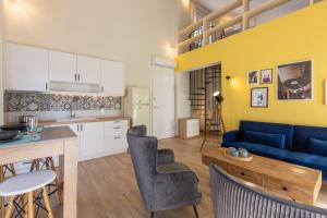 A kitchen or kitchenette at Two Olive Trees - Deluxe Apartments