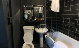 Koupelna v ubytování Castledillon Estate Cottage