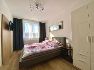 Posteľ alebo postele v izbe v ubytovaní Apartmány U Jelena 2