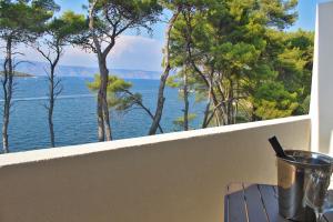 a balcony with a view of the water at Covahouse in Jelsa