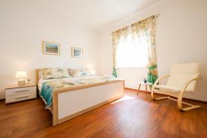 Postel nebo postele na pokoji v ubytování Holiday home in Ist - Insel Ist 39017