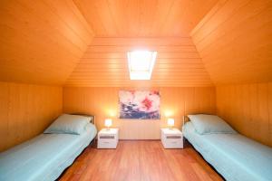 Un pat sau paturi într-o cameră la Holiday home in Ist - Insel Ist 39017