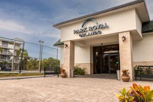 a park royal standard building with a bench outside at Park Royal Orlando in Kissimmee