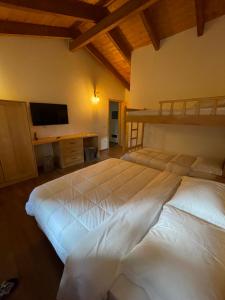 A bed or beds in a room at Baresha Agroturizem