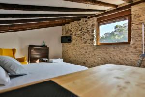 Posteľ alebo postele v izbe v ubytovaní Casa Bitibau