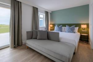 Llit o llits en una habitació de The Smugglers Inn