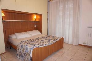 Postel nebo postele na pokoji v ubytování Apartment in Porto Santa Margherita 40285