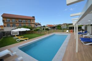 Bazén v ubytovaní Hotel Cachada alebo v jeho blízkosti
