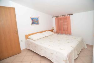 Posteľ alebo postele v izbe v ubytovaní Apartment in Kukljica - Insel Ugljan 39720