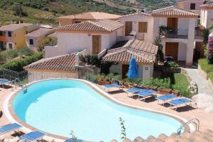 Bazén v ubytovaní Holiday home Budoni - Insel Sardinien 27735 alebo v jeho blízkosti