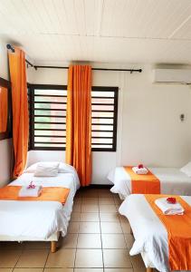 Krevet ili kreveti u jedinici u okviru objekta Hotel Oasis de Kiamu