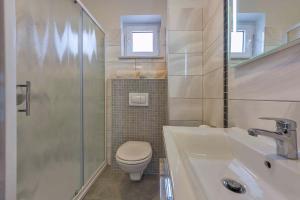 Kúpeľňa v ubytovaní Apartments in Peroj/Istrien 34288 + 11 fotografií