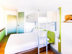 Postel nebo postele na pokoji v ubytování ibis Budget - Dandenong