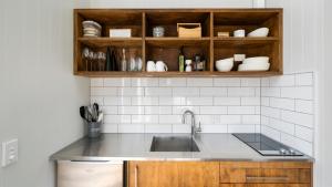 Η κουζίνα ή μικρή κουζίνα στο Te Whare Hipi - Martinborough Holiday Home +11 φωτογραφίες