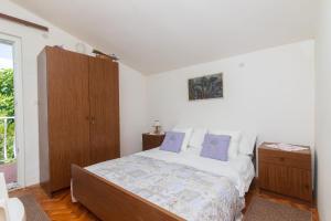 Postel nebo postele na pokoji v ubytování Apartment Margarita + 11 fotografií