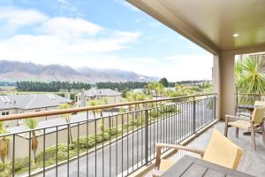 a balcony with a view of the mountains at High Country Villa 250 - Terrace Downs in Windwhistle