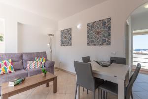 Posezení v ubytování Pondarosa Penthouse 55 - Costa CarpeDiem