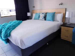 Postel nebo postele na pokoji v ubytování Alara Motor Inn