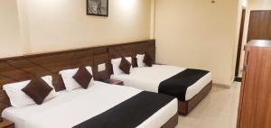 Hotel The Vaishno Devi Hills客房内的一张或多张床位