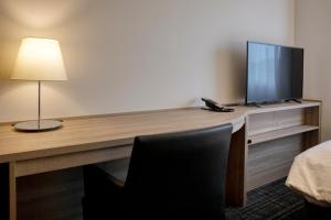 TV a/nebo společenská místnost v ubytování Glocal Hotel Itoshima