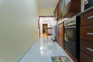 Kuchyň nebo kuchyňský kout v ubytování Eugénia e Filhas Holiday house