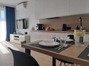 Kuchnia lub aneks kuchenny w obiekcie Apartamenty Marzeń