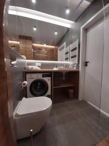 Łazienka w obiekcie Apartamenty Marzeń
