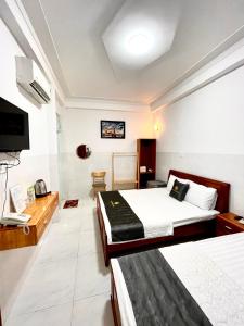 Televiisor ja/või meelelahutuskeskus majutusasutuses HẢI PHƯƠNG Hotel