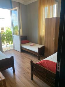 Postel nebo postele na pokoji v ubytování Guest house polaris