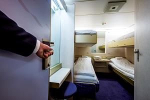 Postel nebo postele na pokoji v ubytování DFDS MiniCruise Oslo - Copenhagen - Oslo