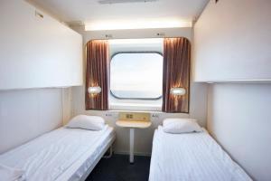 Postel nebo postele na pokoji v ubytování DFDS MiniCruise Oslo - Copenhagen - Oslo