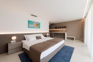 Aparthotel Joel客房内的一张或多张床位