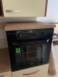 Kuchyň nebo kuchyňský kout v ubytování Miško Apartmani